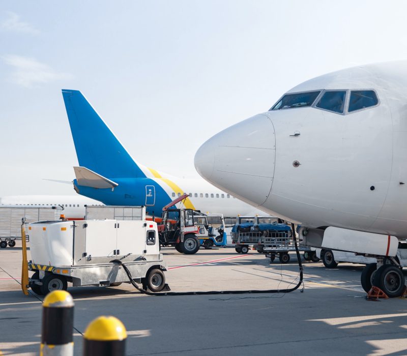 Refueling of the airplane before flight. Aircraft maintenance fuel at the airport outdoors